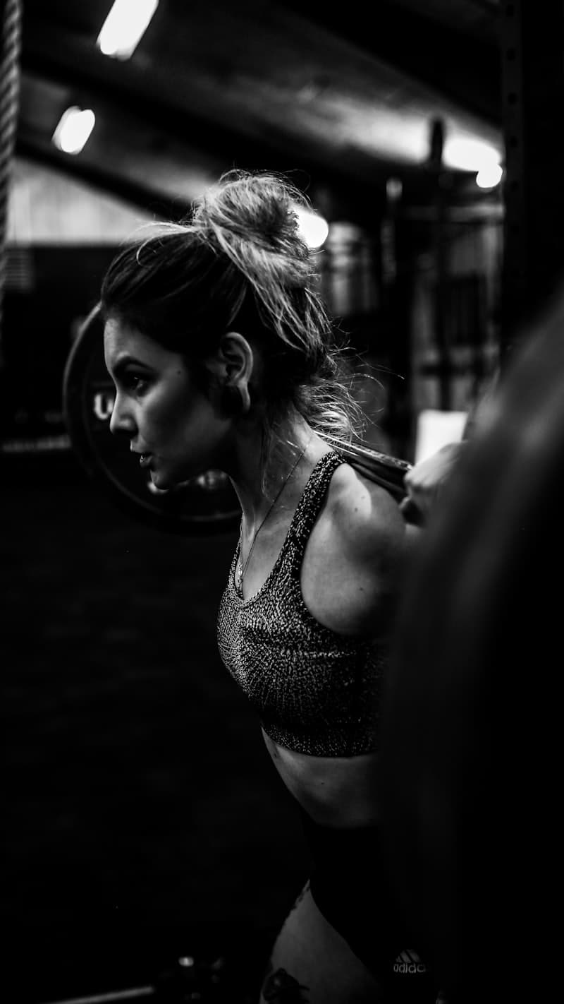 Creator filming in a gym at night